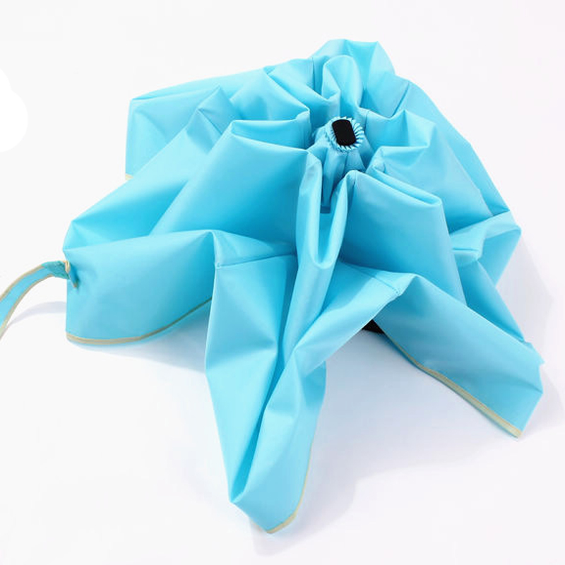 blauer Mini-Regenschirm für die Tasche