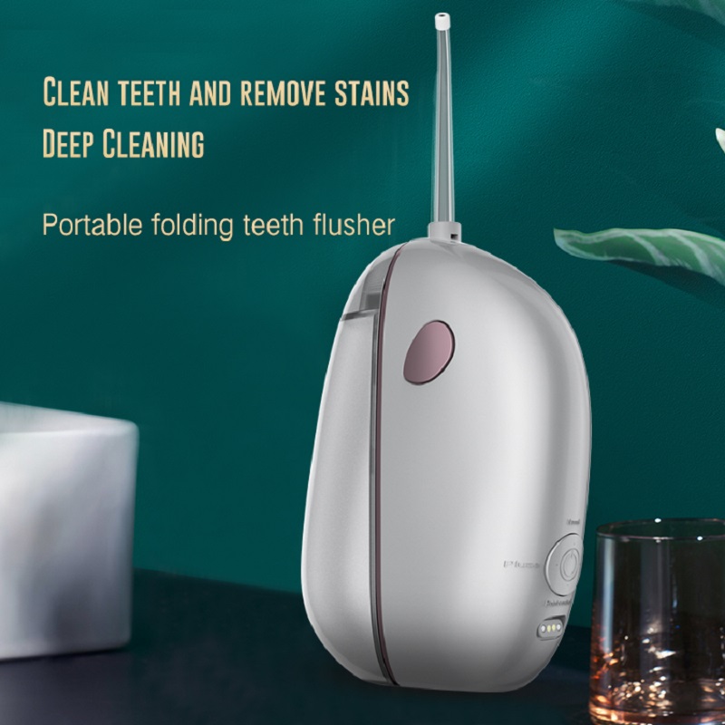 Fabrikangebot Oralpflege-Sterilisation Zahnreiniger tragbare Wasser-Flosh-Zähne Reinigung und weiße Tragbare Faltzähne