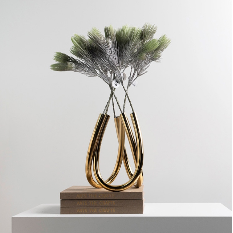 Metallbogenvase